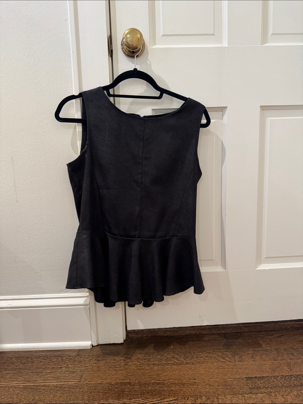 Sleeveless Black Peplum Tunic Top - Classic Silhouette